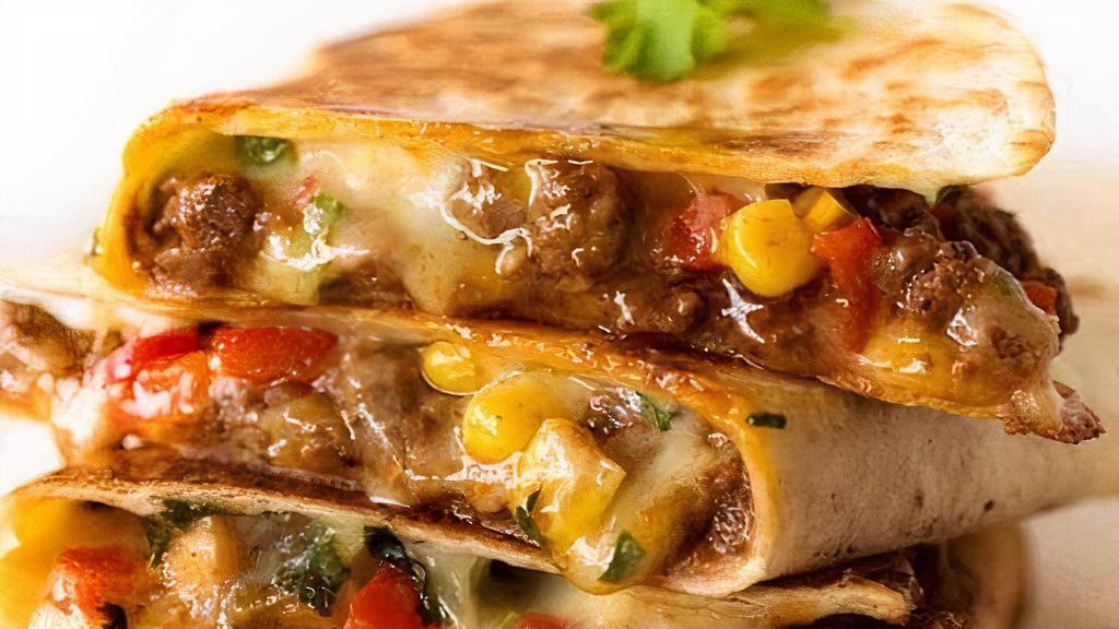 Eggspresso Quesadilla · Your choice of meat: chicken, steak or chorizo.. Served with sour cream, salsa and your choice. of French fries, sweet potato fries, cottage. cheese or a cup of soup of the day