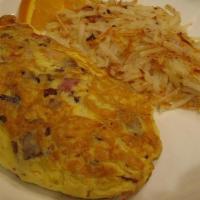 Meat Lover'S Omelette · For meat lovers – diced ham off the bone, bacon and sausage baked with Jack and cheddar chee...