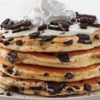 Oreo Pancakes · Oreo cookie crumbles in the batter and. sprinkled on top with whipped cream