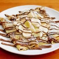 Nutella Banana Crepes · Fresh sliced bananas rolled into three crepes. Topped with a rich Nutella spread