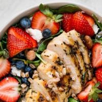 Laura'S Sweet & Wild Salad · Spinach strawberries blueberries roasted pecans avocado, scallions blue cheese and chicken b...
