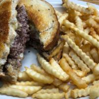 Patty Melt · Juicy 1/2 lb burger served on rye bread with melted Swiss cheese and grilled onions with chi...