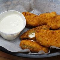 Jalapeno Poppers · 6 battered and fried jalapenos filled with cheese and served with ranch.