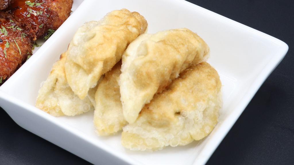 Gyoza (5Pc) · Fried dumplings.