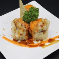 Honey Stone Roll · Deep fried crab, avocado, shrimp tempura, and cream cheese.