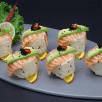 Hawaiian Roll · Soypaper wrapped spicy tuna, crab, topped with fresh salmon and avocado.