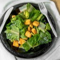 Large Caesar Salad · Fresh Romaine Lettuce, Croutons, Shredded Red Cabbage and Carrots.