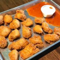 12 Boneless Chicken · A dozen boneless chicken wings! Choose your sauce! (Select up to 2).