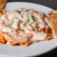 Penne · Served with garlic bread.