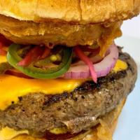 Onion Burger · 8 oz. Angus beef burger, American Cheese, caramelized onion, pickled onion, pickles, red oni...