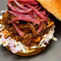 Pork 'Wich · New. Smoked pulled pork smothered in Smokeheads Texas Mop Sauce, topped with pickled onions ...
