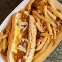 Chili Cheese Dog · Vienna beef hot dog topped with chili, Cheddar cheese sauce, onion on poppy seed bun, and se...