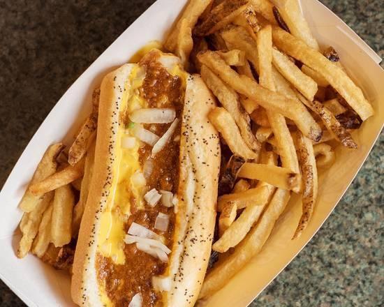 Chili Cheese Dog · Vienna beef hot dog topped with chili, Cheddar cheese sauce, onion on poppy seed bun, and served with fries on top.