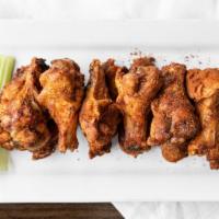 Wings · Choose from a dozen hickory smoked bone-in wings, or a dozen beer and buttermilk marinated h...