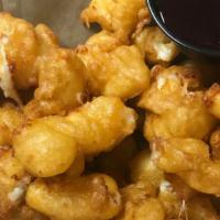 Summit Epa Beer Battered Ellsworth Cheese Curds · Served with homemade berry ketchup.