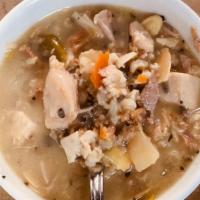 Turkey Wild Rice Soup · Whole turkey simmered with carrots, Minnesota wild rice and brown rice and finished with cre...