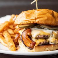 Double Cheeseburger · Two 1/4 lb patties of house-ground, chef-selected beef, American cheese, homemade pickles, b...
