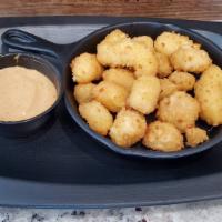 Cheese Curds · With chipotle ranch.