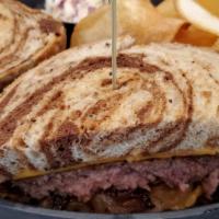 Patty Melt · American cheese, caramelized onions between thick grilled rye bread.