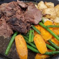Pot Roast · Pot roast, seasonal vegetables, roasted potatoes, bread and butter.