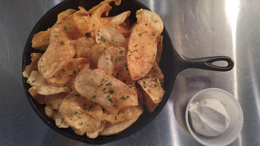 Home-Made Chips · Served with sour cream.
