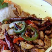 Ma La Ji Ding · Spicy. Sliced marinated chicken stir-fried with red onion, jalapeño, dried chili in brown sa...