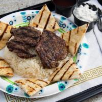 Steak Over Rice · Beef tenderloin.