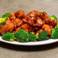 Orange Flavored Beef Or Chicken · Hot and spicy. Breaded slices of beef or dark meat chicken sauteed in a tangy and spicy sauce.