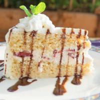 Tres Leches Cake · Our famous Mexican cake made with real cream. Filled with berries. Gluten free