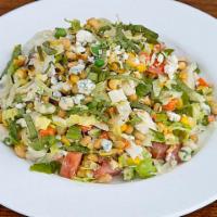 Small-Our Chopped Salad · Blue cheese, wasabi peas, roasted corn, carrot, tomato, jicama, cabbage, and blue cheese-lem...