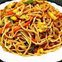 Egg Chowmein · Boiled noodles, deep-fried boiled egg, soy sauce, chowmein Masala, chopped red onions, cilan...