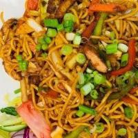 Goat Chowmein · Boiled noodles, cooked goat meat, soy sauce, chowmein Masala, chopped red onions, cilantro, ...