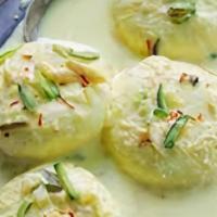 Rasmalai 2Pcs With Syrup · Whole milk and sugar syrup processed for one day to prepare Rasmalai