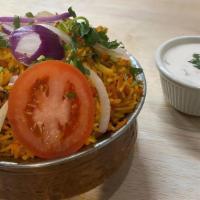 Veg Biryani · Half cooked mixed fresh vegetables, paneer, green peas, butter, long grain Basmati Rice, Yak...