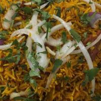 Goat Fried Rice · Goat meat with bones, Basmati Rice, Yak N Yeti Special Masala