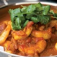 Shrimp Karai · Shrimp, Yak n yeti curry masala, dry chili, red-yellow dice onions, red-black bell pepper dice