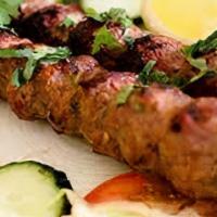 Lamb Boti Kabab · Marinated boneless lamb, Yak N Yeti Kabab Masala, lemon juice, red-yellow onions, food color...