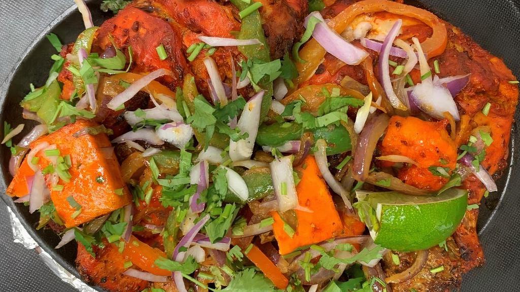 Tandoori Mixed Grill · Combo of 8 items- chicken tandoori, Shrimp tandoori, paneer tikka kabab, Chicken mint kabab, chicken tikka kabab, lamb-boti kabab, chicken swiss kabab, Goat Boti Kabab