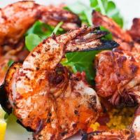 Tandoori Shrimp · Marinated tandoori raw shrimp, Yak N Yeti Tandoori Masala, lemon juice, red-yellow onions, f...