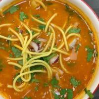 Goat Thukpa · Boiled noodles, cooked goat meat, Thukpa masala, tomato gravy, fresh tomato, lemon, chopped ...