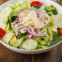 Side Salad · Romaine and iceberg lettuce, spinach leaves, cucumbers grape tomatoes, red onion, and shaved...