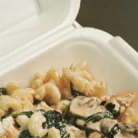 Chick'S Pasta · Cavatappi pasta loaded with breaded chicken, spinach, and mushroom. Tossed in homemade alfre...