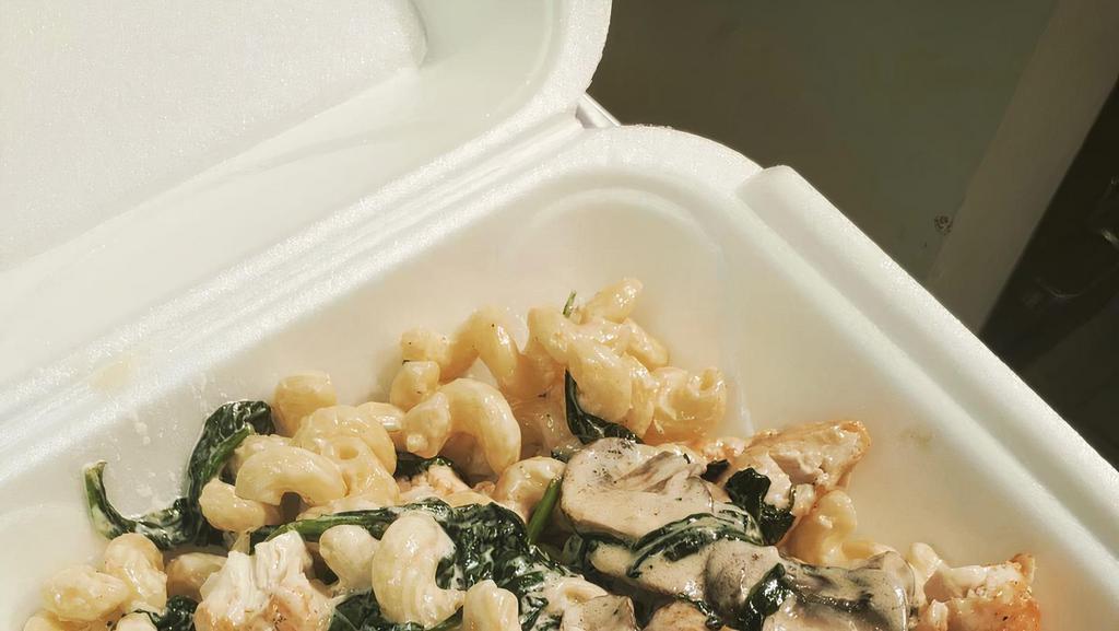 Chick'S Pasta · Cavatappi pasta loaded with breaded chicken, spinach, and mushroom. Tossed in homemade alfredo sauce.
