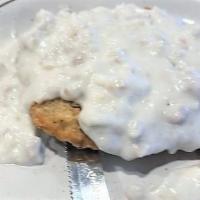 Biscuits & Gravy · Two biscuits served with a bowl of sausage gravy.