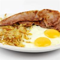 2 Eggs Any Style With Ham · Carved off the bone.