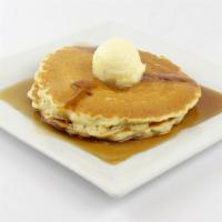 The Original Buttermilk Pancakes 2 Stack · Served with whipped butter and syrup. Garnished with a dusting of powdered sugar.