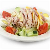 Julienne Salad · Fresh Iceberg mix, julienne of cheese, ham and turkey, hard boiled egg, tomato, cucumbers, a...