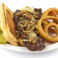 Skirt Steak Sandwich · On garlic bread with grilled mushrooms and onions. Served with side and a cup of soup.