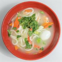 Udon Noodle Soup · Served with shrimp crabmeat and vegetables.