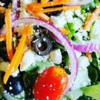Flippin Mediterranean Salad · Mixed greens, tomatoes, red onions, olives, feta cheese, pepperoncini, cucumbers & shredded ...